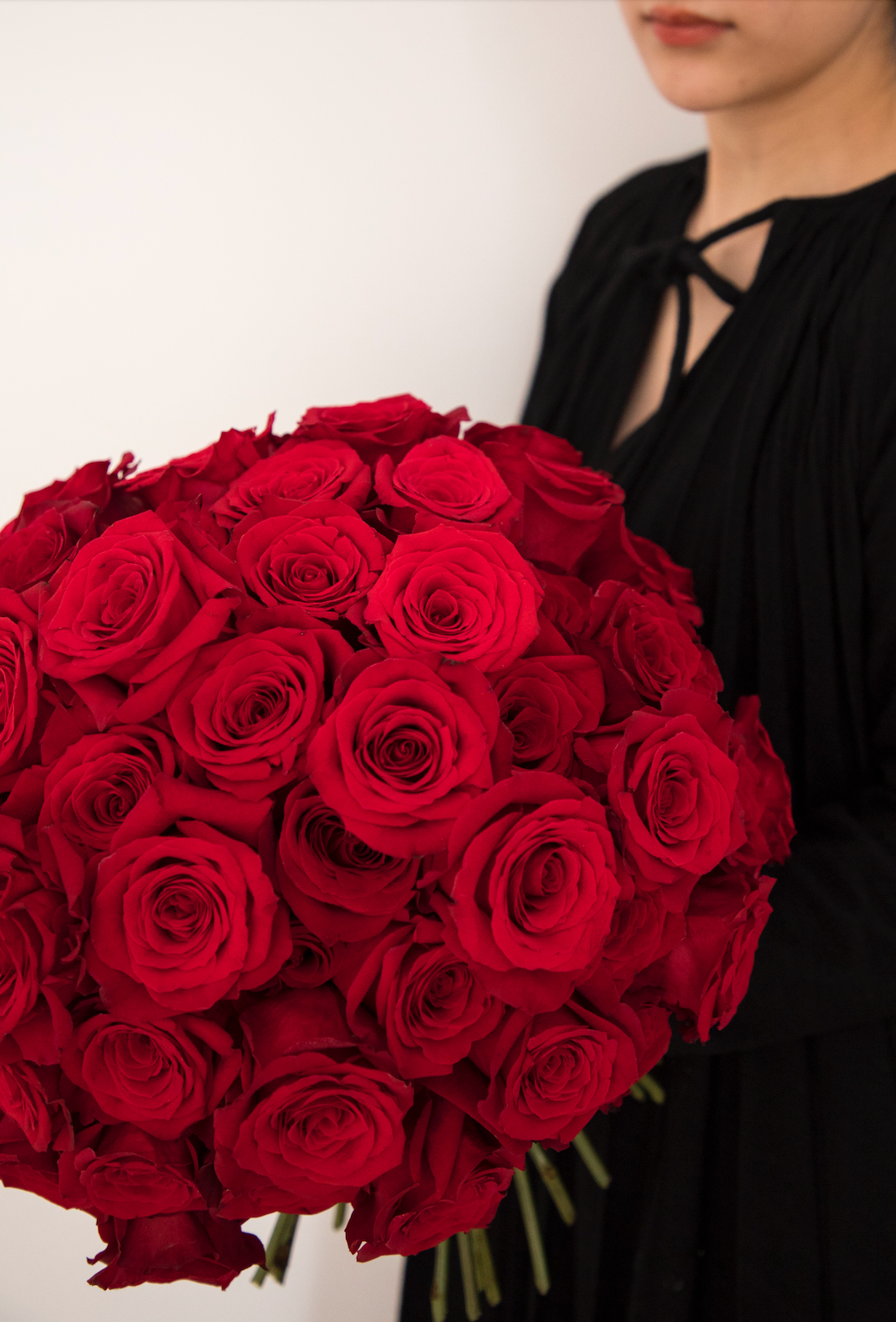 Pink dress with red sales roses